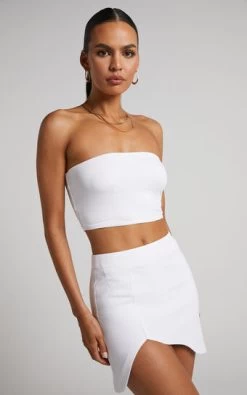 Showpo Abril Mini Skirt - Wave Hem Skirt In White