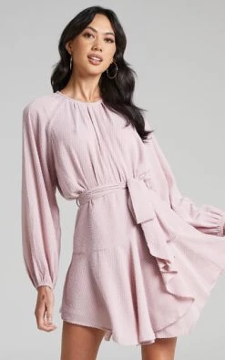 Showpo Adleigh Asymmetric Hem Long Sleeve Mini Dress In Pink