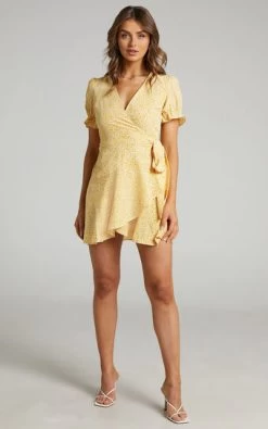 Showpo Azelle Wrap Mini Dress In Yellow Floral